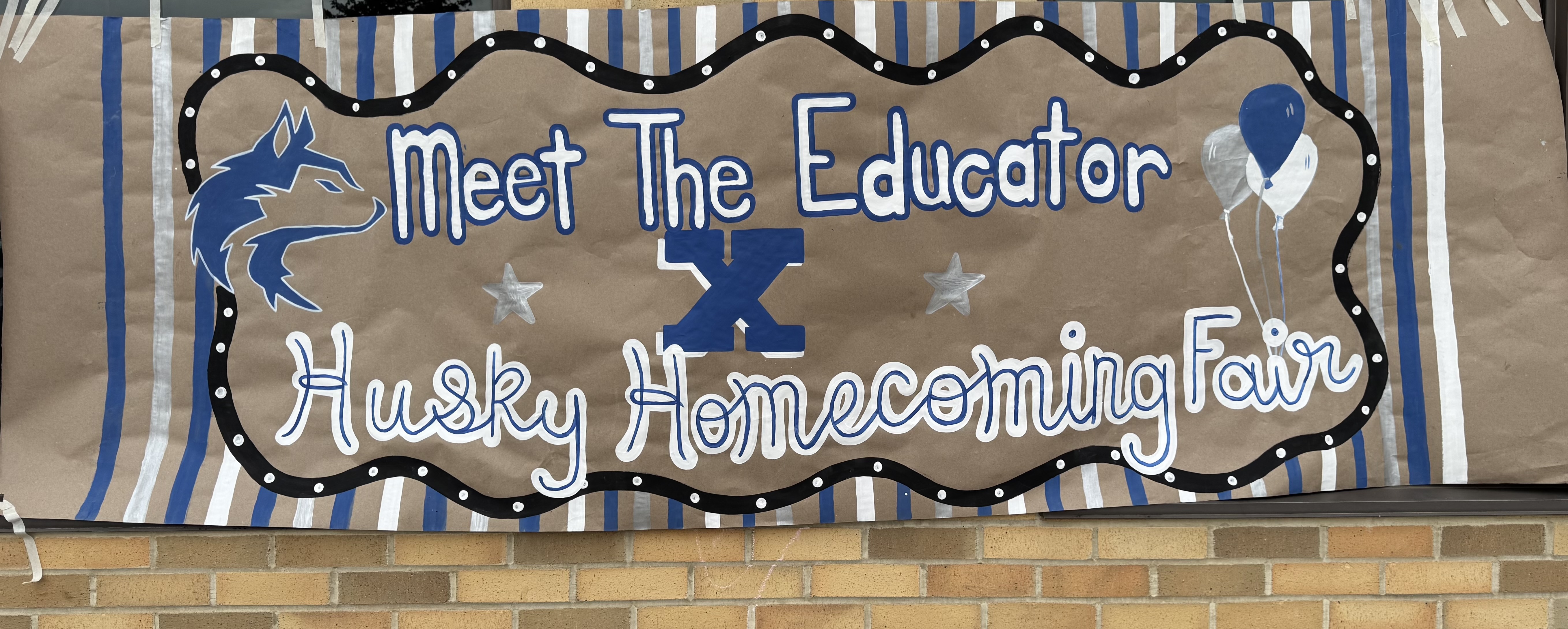 Meet the Educator x Husky Homecoming School Event Sign