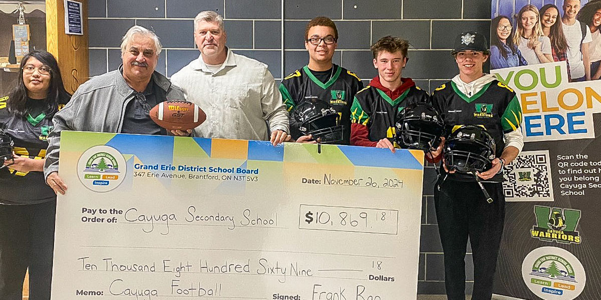 CSS Students stand with Haldimand resident Frank Rao, who donated $10,869 to Cayuga Secondary's football sports fund