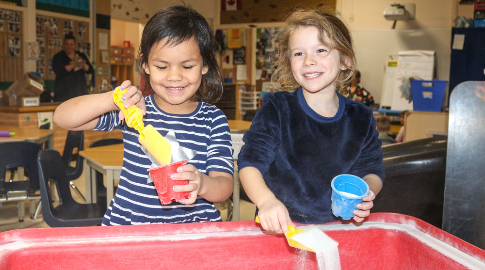 Children playing with sand