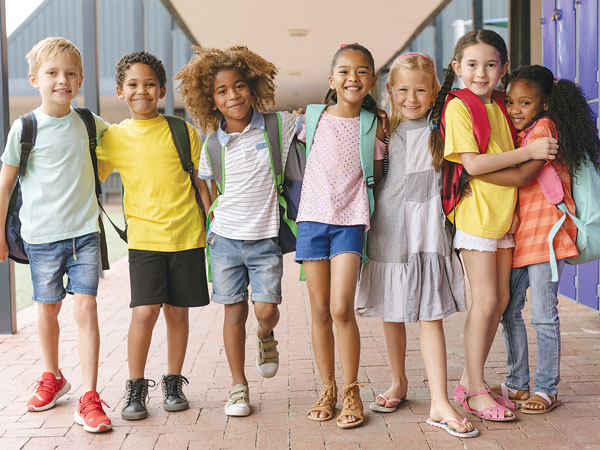 Students standing outside of school