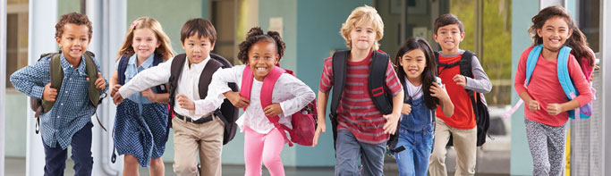 Kindergarten students running at recess