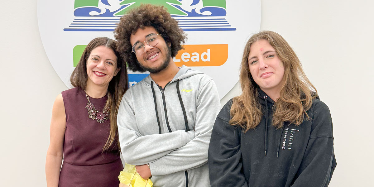 From left: Grand Erie Director of Education, JoAnna Roberto with students Elijah Liverpool and Heather Hill.