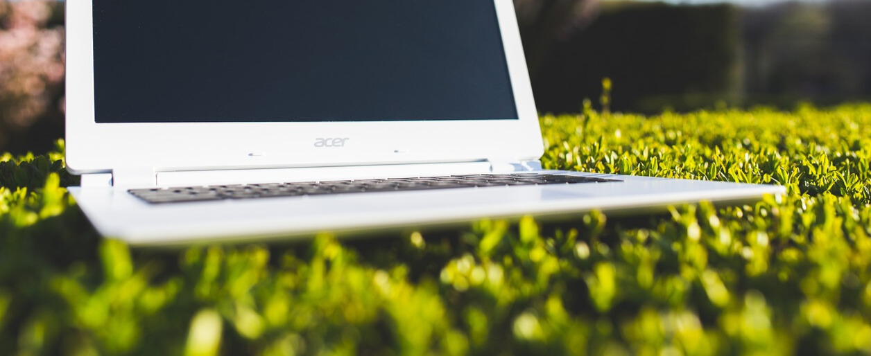 a laptop in a backyard