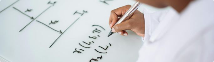 someone is writing white board with greek alphabet