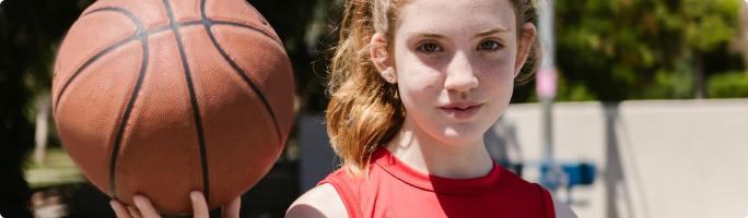 a basketball ball with a student