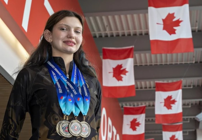 Genevieve Wey wearing swimming medals Genevieve Wey wearing swimming medals