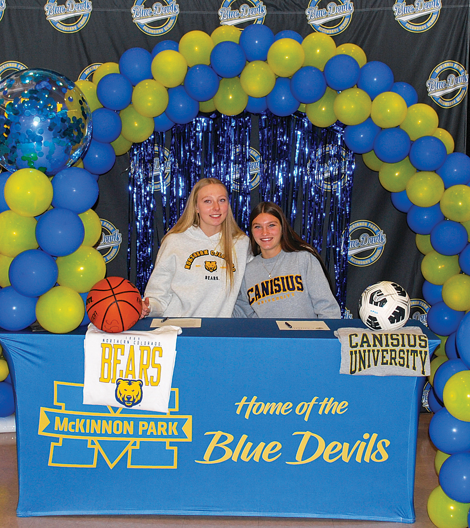Signing-Day- McKinnon Park Secondary students Averie Marciniak-Varhaug (left) and Emmersyn Roy