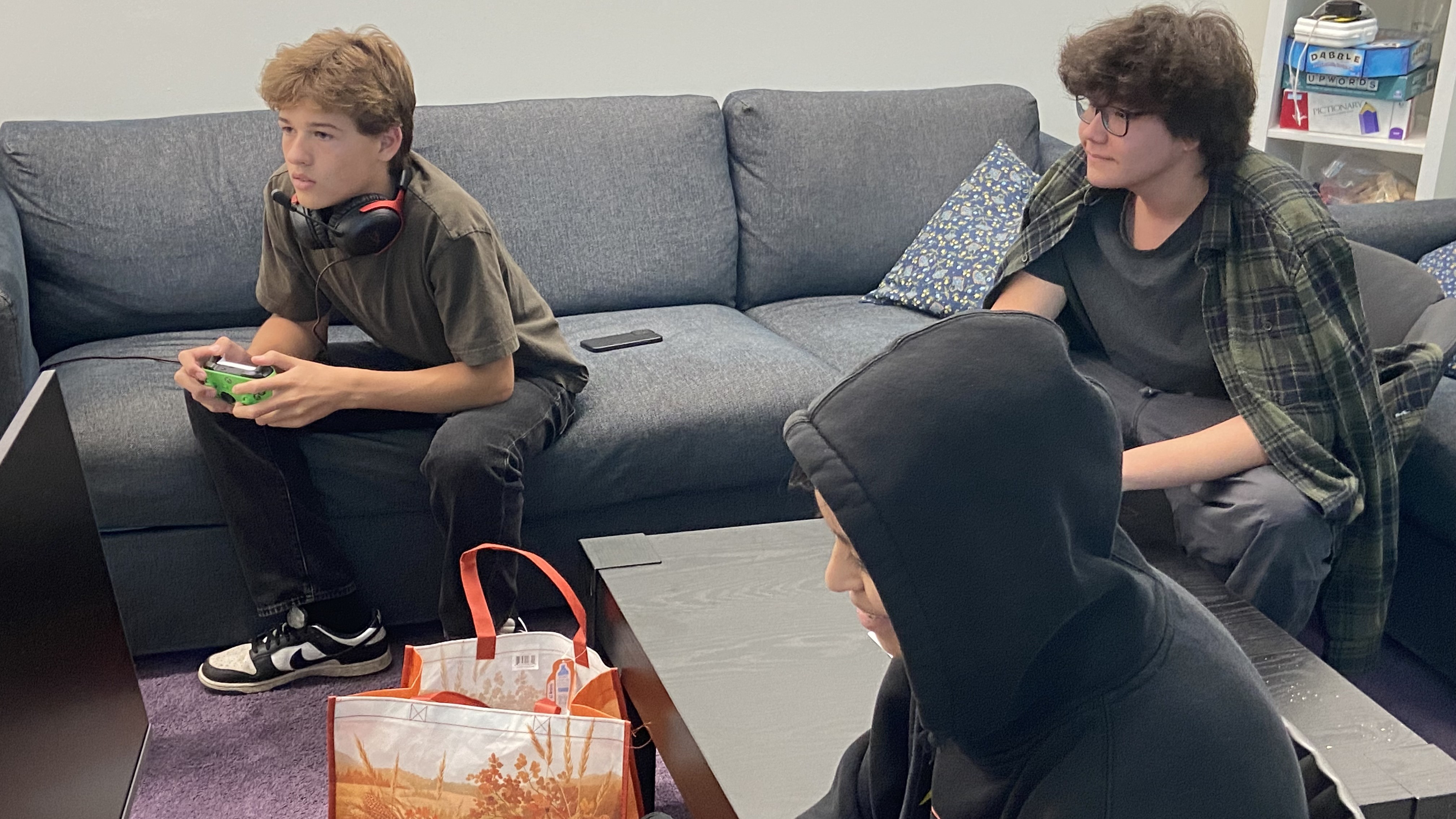 Three students playing esports