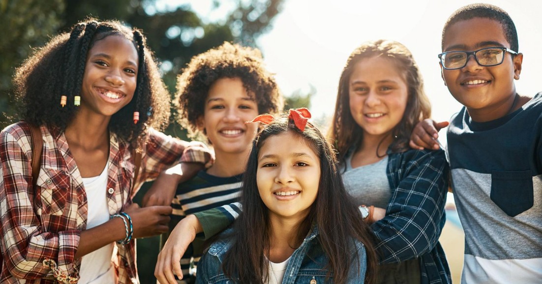 Group of multi-racial students smiling at camera