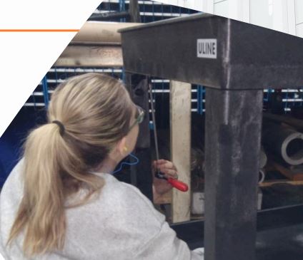 student is assembling a part