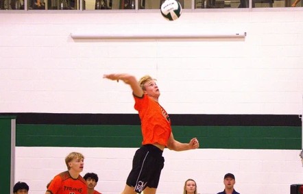 Jacob Slykerman playing volleyball Jacob Slykerman playing volleyball